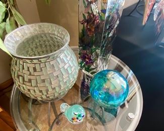 Glass bird, orb, hurricane and vase