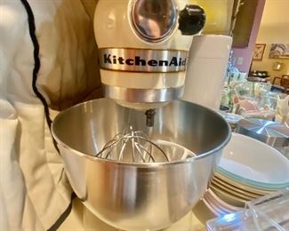 Kitchen mixer with cover and attachments
