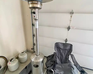 Patio heater and Eddie Bauer camp chairs