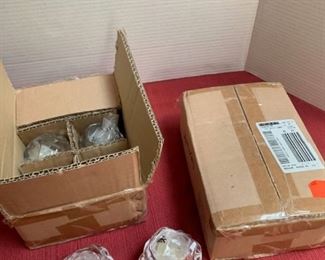 12 glass votives with candles