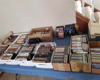 CDs, DVD movies and tv series, VHS tapes. Star Wars DVDs and VHS