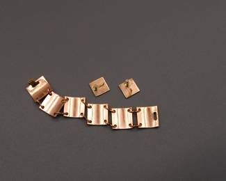 Reverse of  Audrey & Robert Engstrom enamel on copper matching bracelet and screw on earrings set