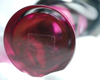 Base of the Murano glass figure, retains it original label