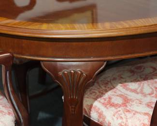 Detail on the Drexel dining table with two leaves and six dining chairs
