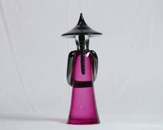 Another view of the Murano glass figure, retains it original label