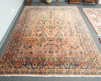 Another angle of the semi-antique Persian Sarouk room size rug measuring about 8' by 10' in excellent overall condition with very minor OLD moth damage on one end.  Overall a gorgeous rug with a wonderful sheen.