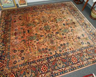 Semi-antique Persian Sarouk room size rug measuring about 8' by 10' in excellent overall condition with very minor OLD moth damage on one end.  Overall a gorgeous rug with a wonderful sheen.