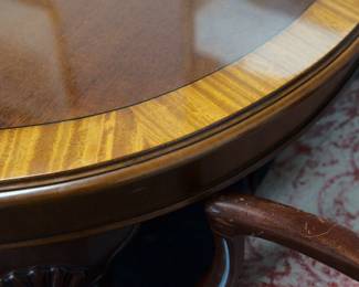Detail on the Drexel dining table with two leaves and six dining chairs
