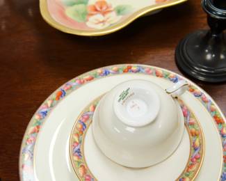 Detail on the antique Copeland Spode luncheon service with banded fruit designs on the border