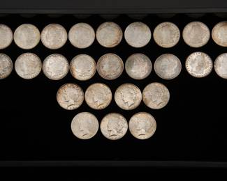 Twenty Five old silver dollars, eighteen (18) Morgan Silver Dollars and seven (7) Peace Silver Dollars