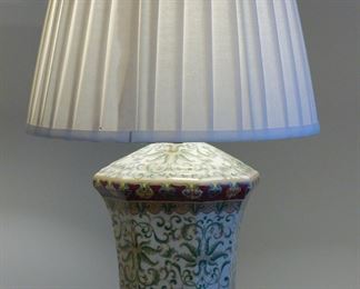 Contemporary Chinese lamp, measures 12" to bottom of socket and 24" to tip of finial.  Shown lit.
