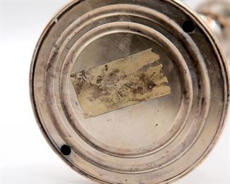 Underside of the stately pair of silverplate candelabrum by the Friedman Silver Company retaining their decorative finials