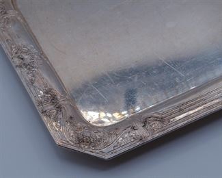 Detail view of the antique Barbour Silver Plate Company/International Silver Co footed rectangular tray with canted corners