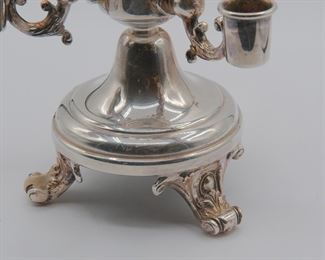Detail on the lovely antique silver plate three arm centerpiece