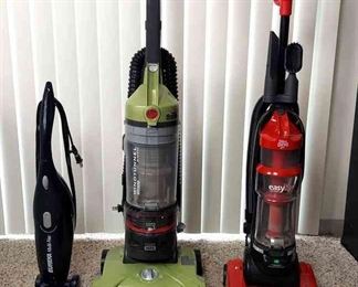Three Upright Vacuum Cleaners