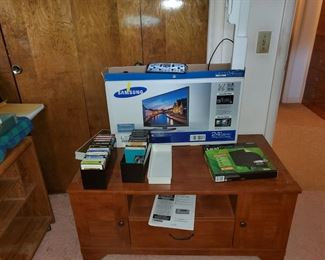 Sauder TV stand and a Samsung tv used 1 time