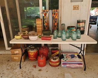 Croquet,  blue ball jars, and flower pots