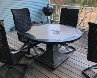 Outdoor metal dining table with 4 chairs. 