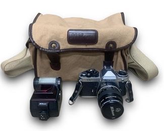 Nikon FE2 35mm Film Camera w/ A Nikon Micro-NIKKOR 55mm f/2.8 LensAnd Nikon Branded Carrying Case!
