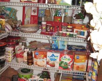 Kitchen:  More cake mixes plus frosting than anyone can use, Pyrex bowls, Can Goods and lots of food  