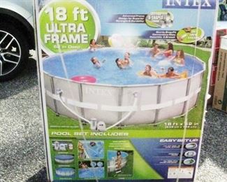 Garage: 18ft Ultra Frame by Intex  New in Box. Has everything.  Pump-Ladder----(Does not include water)
