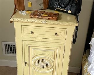 Pair of Lillian August, end tables, purses on top, no longer available