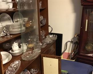 Full China cabinet and floor standing quartz clock