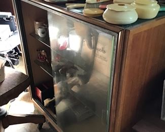 Medium size all wood display cabinet with sliding doors