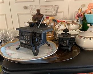 Queen cast iron stove medium and small