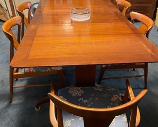 Mid century modern table with four leaves and set of 6 chairs