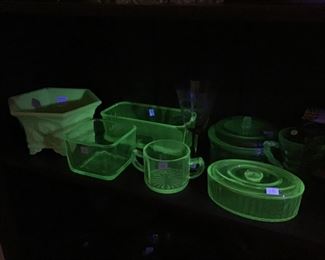 2 shelves of uranium glass , dishes, etc…
