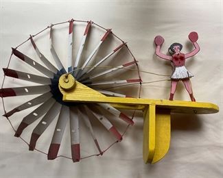 Vintage folk Art whirligig with cheerleader & metal blades