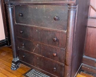 Antique Empire dresser with 6 drawers & claw feet.