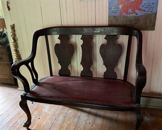 Victorian parlor settee with claw feet & leather seat