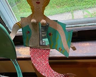 Small painted aluminum mermaid mirror