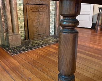 Antique 5-leg antique dining table with 5 leaves.