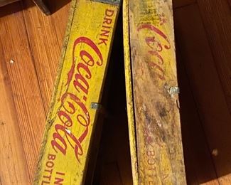 Vintage wood Coca-Cola crates sold separately.