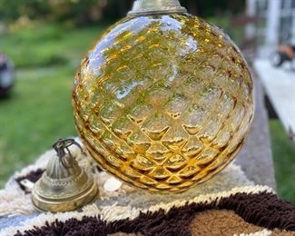 Large vintage amber glass pendant light fixture.