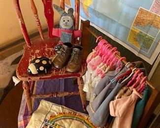 Much children’s books, toys, dolls, doll clothes, doll house & chairs.