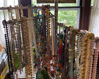 Much vintage costume jewelry: necklaces, cuff links, bracelets, brooches & athletic medals. Many pieces for jewelry-making fun.