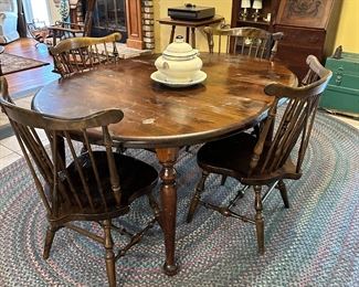 table with 1 leaf and 4 chairs