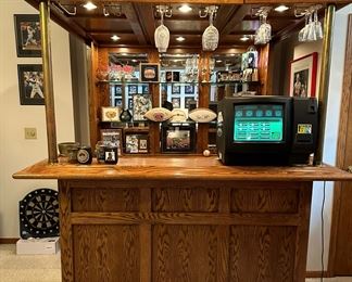 Free Standing Lighted Oak Bar with Brass Supports and Brass Footrest