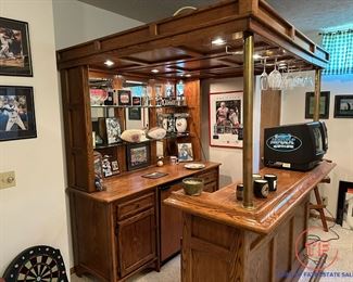 Free Standing Lighted Oak Bar with Brass Supports and Brass Footrest