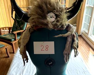 $1,500 - $1,750.	Native American headdress with ermine pelts.