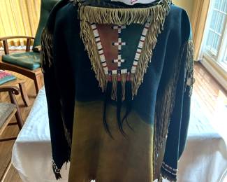 $1,000 - $1,250. Beaded powwow shirt (third quarter of 20th century).