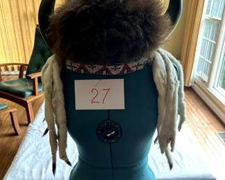 $1,500 - $1,750. Native American headdress with ermine pelts.