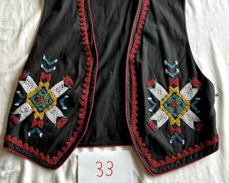 $250 - $500.	Beaded vest