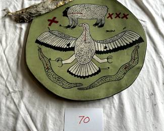 $1,000 - $1,500.	Native American pictorial rawhide and beaded shield.  Measures 15" in diameter.