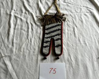 $400 - $600.	Native American beaded bag.  Measures 4.5" by 10".