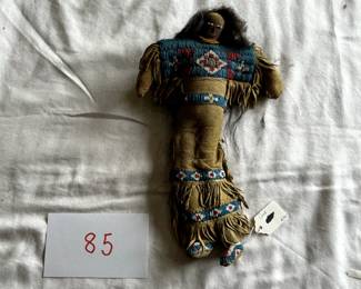 $750 - $1,000.	Native American beaded dance doll.  Measures approximately 13" tall.